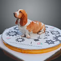 Brown and white Basset Hound sitting on circular platform decorated with gear patterns 3d model