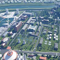 Aerial View of Modern Industrial Plant Featuring Large Domed Storage Tanks and Green Spaces