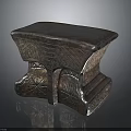 Vintage Bronze Colored Stool With Intricate Carved Patterns And Decorative Base