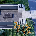 Modern Landscape Seating In Outdoor Garden With Lush Green Plants And Central Fire Pit