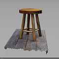 Rustic Wooden Stool With Round Seat On Blue Wooden Plank Base