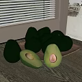 Fresh Green Avocado Halves with Pit and Whole Ones on Wooden Tray on Dark Table