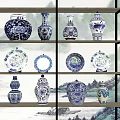 Traditional Blue and White Ceramic Wares on Wooden Display Shelf with Landscape Painting Background