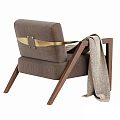 Brown Fabric Accent Chair with Walnut Wood Frame Beige Throw Blanket and Decorative Balls