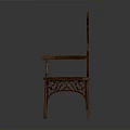 Antique Wooden Armchair With Intricate Carved Backrest Ornate Armrests And Decorative Spire Top