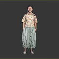 A Woman Wearing Floral Shirt And Green Skirt Standing On Gray Background