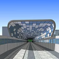 Modern Station Design With Glass Roof Along Road And Green Area Tracks