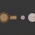 Decorative Household Items With Various Plates And A Small Paper Card