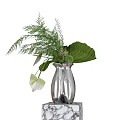 Decorative Ornament Set with Silver Vase Green Plants Large Leaves and White Flowers
