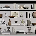 Decorative Ornament Collection with Sculptures Vases Bowls Books and Frames on White Tiered Shelf