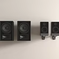Two Large And Two Small Black Speakers Mounted On Light Colored Wall Home Audio System 3d model
