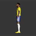 Man In Yellow Brazilian Football Jersey Blue Shorts With Number 10 Standing Against Dark Background