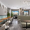 Modern Restaurant Interior With Hanging Lights Booths Tables Chairs Green Plants And Windows