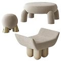 Beige Upholstered Stool With Curved Seat Design And Unique Wooden Leg Structure