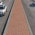 Urban Road Infrastructure Featuring Central Brick Paved Footpath And Asphalt Side Lanes