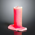 Red Burned Candle with Melted Wax Dripping on Black Surface Daily Living Item