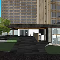 Two Modern Skyscrapers With Glass Facades Against Blue Sky And Greenery