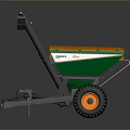Orange And Green Agricultural Fertilizer Spreader Vehicle With Black Wheels And Mechanical Arm