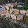 Aerial Planning of Modern Apartment Complex with Greenery and Roads in Organized Layout
