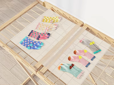 Colorful Patterned Socks Laid Out On Wooden Drying Rack With Mesh Cloth 3d model
