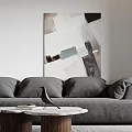 Modern Living and Dining Room Interior With Gray Sofa Round Coffee Tables And Abstract Artwork