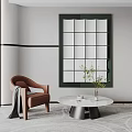 Contemporary Living Room With Brown Armchair Round Coffee Table And Green Framed Grid Mirror