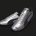 Silver PUMA Sports Shoes with Streamlined Design and Brand Logo