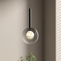 Modern Pendant Light With Transparent Glass Shade And Moon Surface Design