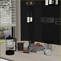 Modern Kitchen Interior With Black Shelves Wine Bottles Green Boxes Coffee Pots And Cookies