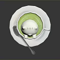 White Ceramic Cup With Green Drink And Cat Shaped Foam On Saucer With Spoon