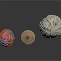 Colorful And White Yarn Balls With Wooden Spool On Black Surface