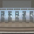 Indoor Multiple Metal Storage Lockers With Glass Doors And Labeled Panels