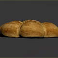 Freshly Baked Golden Round Shaped Bread with Sesame Seeds on Top