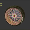 Car Wheel Featuring Golden Rim Black Tire And ADVAN Brand Stylish Design