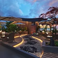 Outdoor Restaurant Terrace with Umbrellas Tables Chairs Green Plants Stone Path Lighting and Sunset Sky