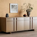 Modern Wooden Entryway Cabinet Sideboard Against Beige Wall With Vase Plant Decor And Wall Art