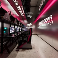 Modern Gaming Cafe Interior With ZOWIE GEAR DYAC2 Monitors And Pink Black Gaming Chairs