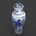 Blue and White Ceramic Vase with Traditional Floral Patterns and Decorative Lid
