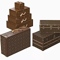 Vintage Patterned Leather Suitcases in Various Sizes Stacked as Classic Luggage Collection