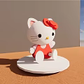 Hello Kitty Doll in Red Dress with Red Bow on Round Base Wooden Floor