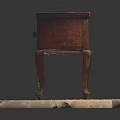 Antique Wooden Bedside Table With Carved Drawer And Decorative Legs On White Base