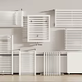 White Radiators With Various Designs Including Wall Mounted And Floor Standing Styles