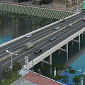 Urban Multi Lane Bridge With Vehicles Driving Over Water And Greenery