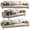 Modern Three Seater Fabric Sofa With Light Beige Throw Pillows And Decorative Blanket