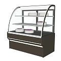 Three Tiered Black White Kitchen Appliance Display Case With Curved Glass And White Cakes