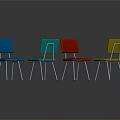 Colorful Blue Green Red And Yellow Chairs With Metal Legs And Floor Reflections