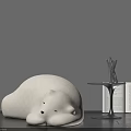 White Polar Bear Shaped Bean Bag Chair With Small Table Metal Sculpture And Open Book