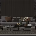 Modern Gray Sofa Coffee Table Combination With Brown Cushions Vase And Decorative Books