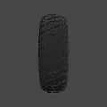 Off Road Vehicle Tire With Deep Tread Pattern And Silver Alloy Rim
