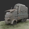 Old Rusty Canvas Covered Military Truck Parked On Green Grass